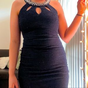 navy blue body-con dress with jeweled neckline